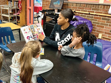 students reading together